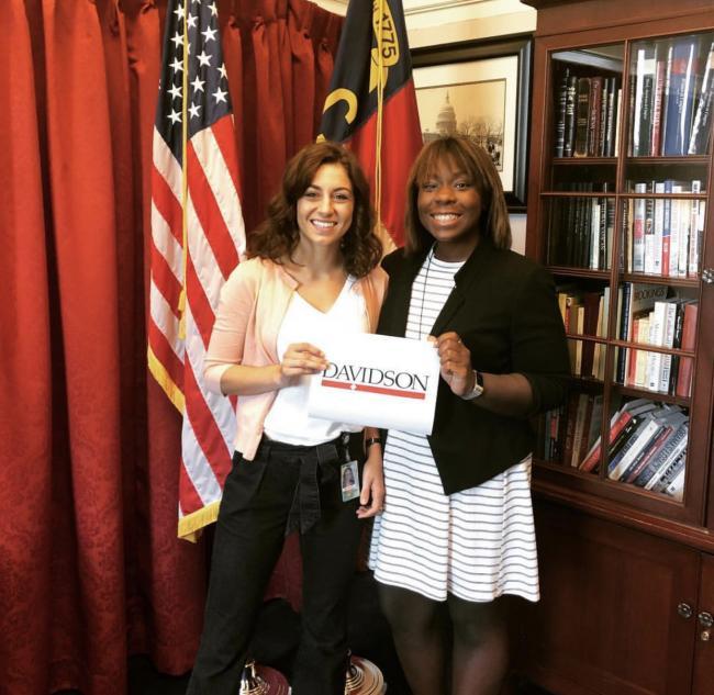 Internship at House of Representatives where  student and alum pose for a photo