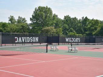 Tennis courts that are branded with  Wildcats