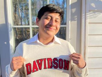 Recently admitted class of 2021 shows off his new  sweatshirt